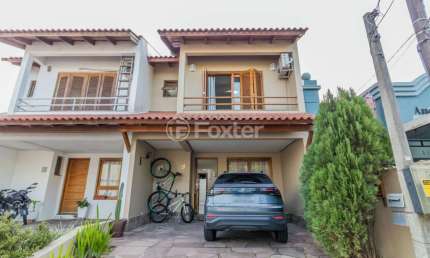 Casa em condomínio fechado com 3 quartos à venda na Rua Guatambu, 37, Hípica, Porto Alegre, 108 m2 por R$ 580.000