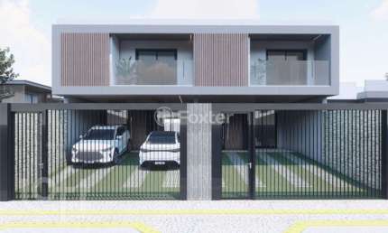 Casa com 3 quartos à venda na Rua Roberto Szupszynsk, 8, Igara, Canoas, 180 m2 por R$ 1.290.000
