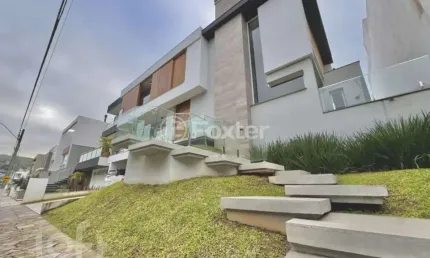 Casa em condomínio fechado com 4 quartos à venda na avenida edgar pires de castro, 1780, hípica, porto alegre, 488 m2 por r$ 3.180.000