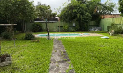 Casa com 3 quartos à venda na Rua Jataí, 820, Cristal, Porto Alegre, 600 m2 por R$ 1.600.000
