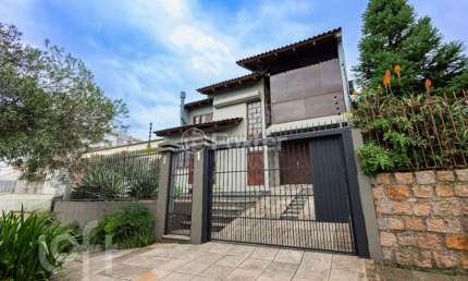Casa com 4 quartos à venda na Rua Professor Abílio Azambuja, 104, Jardim do Salso, Porto Alegre, 208 m2 por R$ 1.225.000