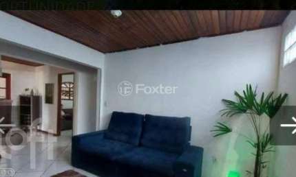 Casa com 3 quartos à venda na Rua Araújo Viana, 651, Morada do Vale I, Gravataí, 180 m2 por R$ 450.000