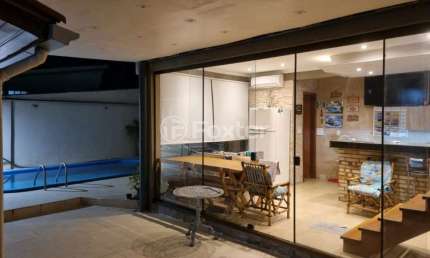 Casa com 4 quartos à venda na Rua Ney Brito, 184, Parque Santo Inácio, Esteio, 180 m2 por R$ 1.200.000