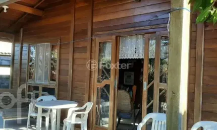 Casa com 4 quartos à venda na Avenida Astrogildo Quadros, 106, Pinheira, Palhoça, 70 m2 por R$ 695.000