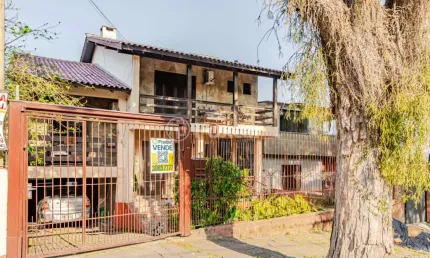 Casa com 4 quartos à venda na Rua dos Guananas, 143, Espírito Santo, Porto Alegre, 250 m2 por R$ 950.000