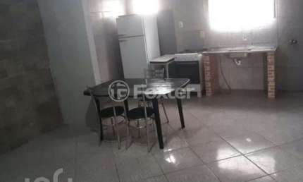 Casa com 6 quartos à venda na Rua Domingos da Silva, 215, Camaquã, Porto Alegre, 240 m2 por R$ 500.000