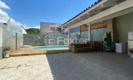 Casa com 4 quartos à venda na Rua Saldanha da Gama, 674, Harmonia, Canoas, 200 m2 por R$ 424.000