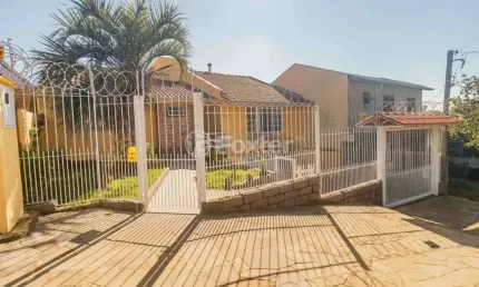 Casa com 2 quartos à venda na Rua General Telino Chagastelles, 640, Parque Santa Fé, Porto Alegre, 138 m2 por R$ 500.000