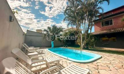 Casa com 4 quartos à venda na Rua Raymundo Carlos Lopes, 174, Campeche, Florianópolis, 135 m2 por R$ 1.890.000