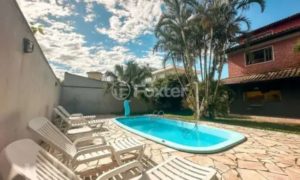 Casa com 4 quartos à venda na Rua Raymundo Carlos Lopes, 174, Campeche, Florianópolis, 135 m2 por R$ 1.890.000