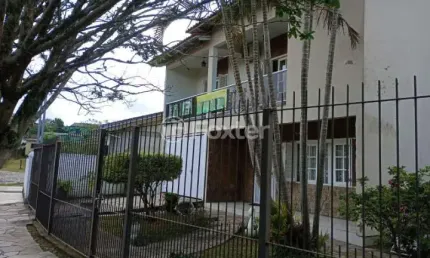 Casa com 3 quartos à venda na Rua Pinto Bandeira, 328, Viamópolis, Viamão, 625 m2 por R$ 950.000