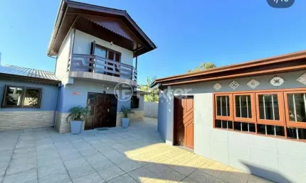 Casa com 3 quartos à venda na Rua Berto Círio, 1199, Berto Círio, Nova Santa Rita, 270 m2 por R$ 950.000