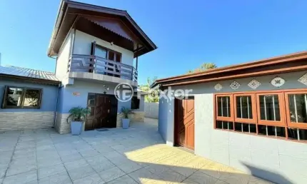 Casa com 3 quartos à venda na Rua Veneza, 1199, Berto Círio, Nova Santa Rita, 270 m2 por R$ 950.000