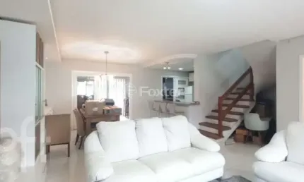 Casa com 3 quartos à venda na Rua Corticeira, 431, Hípica, Porto Alegre, 188 m2 por R$ 699.000