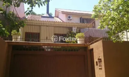 Casa com 3 quartos à venda na Rua Alcebíades Antônio dos Santos, 94, Nonoai, Porto Alegre, 317 m2 por R$ 960.000