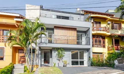 Casa em condomínio fechado com 3 quartos à venda na Rua Adriano Pereira da Silva, 311, Vila Nova, Porto Alegre, 333 m2 por R$ 1.400.000