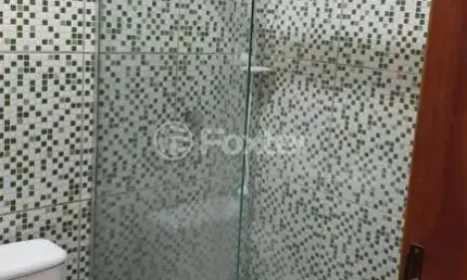 Casa em condomínio fechado com 2 quartos à venda na Rua Santo Antônio, 275, Vera Cruz, Gravataí, 50 m2 por R$ 200.000