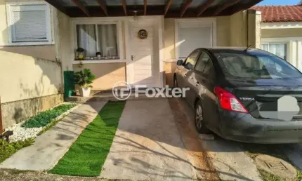 Casa em condomínio fechado com 2 quartos à venda na Rua Oscar Schick, 1911, Formoza, Alvorada, 67 m2 por R$ 255.000