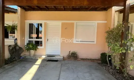 Casa em condomínio fechado com 2 quartos à venda na Rua Santa Eulália, 57, Olaria, Canoas, 57 m2 por R$ 325.000