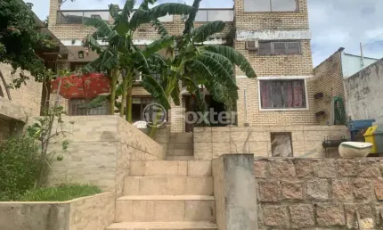 Casa com 3 quartos à venda na Rua Doutor Ernesto Ludwig, 328, Chácara das Pedras, Porto Alegre, 110 m2 por R$ 689.000