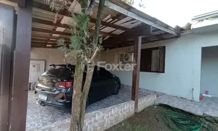 Casa com 2 quartos à venda na Avenida Sílvio Freitas, 521, Morada do Vale II, Gravataí, 76 m2 por R$ 276.600