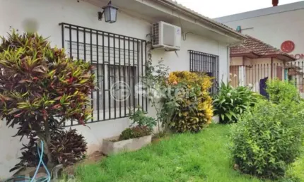 Casa com 2 quartos à venda na Rua Oito de Julho, 35, Jardim Botânico, Porto Alegre, 180 m2 por R$ 850.000