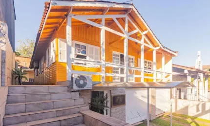 Casa com 3 quartos à venda na rua cachoeira, 54, nonoai, porto alegre, 387 m2 por r$ 450.000