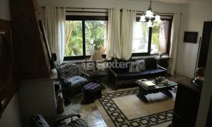 Casa com 4 quartos à venda na Rua General Rondon, 1529, Tristeza, Porto Alegre, 176 m2 por R$ 1.600.000