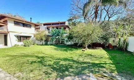 Casa com 4 quartos à venda na Rua Canto da Amizade, 246, Lagoa da Conceição, Florianópolis, 228 m2 por R$ 2.500.000