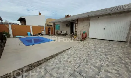 Casa com 3 quartos à venda na Rua Osvaldo Optiz, 522, Estância Velha, Canoas, 154 m2 por R$ 879.000