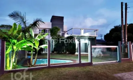 Casa com 3 quartos à venda na Rua Tres Marias, 192, Arco Íris, Capão da Canoa, 200 m2 por R$ 490.000