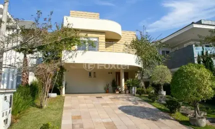 Casa em condomínio fechado com 3 quartos à venda na Rua Itacolomi, 1710, Santa Cruz, Gravataí, 250 m2 por R$ 1.750.000