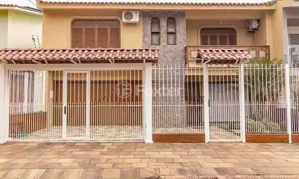 Casa com 3 quartos à venda na Rua Assunção, 210, Jardim Lindóia, Porto Alegre, 310 m2 por R$ 1.700.000
