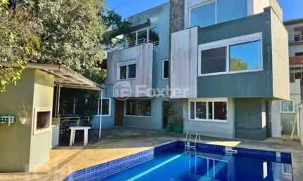 Casa com 4 quartos à venda na rua doutor possidônio cunha, 182, vila assunção, porto alegre, 547 m2 por r$ 5.800.000