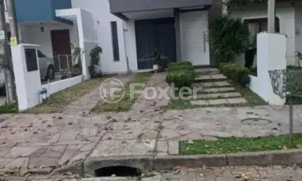 Casa com 3 quartos à venda na rua alexandre de gusmão, 50, hípica, porto alegre, 135 m2 por r$ 699.000