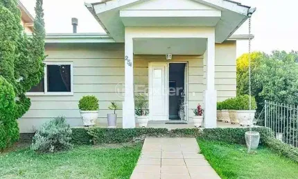 Casa em condomínio fechado com 3 quartos à venda na rua jacarandá, 254, santo onofre, viamão, 263 m2 por r$ 1.380.000