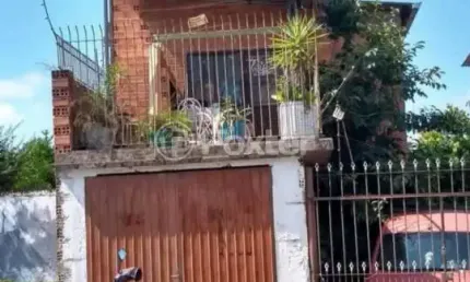 Casa com 2 quartos à venda na rua estácio azambuja, 237, monte belo, gravataí, 88 m2 por r$ 255.000