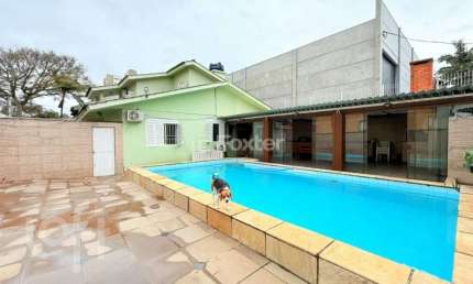 Casa com 4 quartos à venda na rua professor guerreiro lima, 185, partenon, porto alegre, 200 m2 por r$ 1.390.000