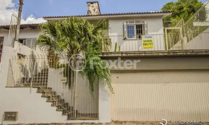 Casa comercial com 2 salas à venda na Travessa Miguel Pereira, 131, Medianeira, Porto Alegre, 224 m2 por R$ 660.000