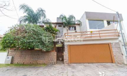 Casa com 4 quartos à venda na Avenida da Serraria, 742, Espírito Santo, Porto Alegre, 284 m2 por R$ 900.000