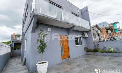 Casa com 3 quartos à venda na Rua Três Mil Setecentos e Quarenta e Oito, 871, Lomba do Pinheiro, Porto Alegre, 160 m2 por R$ 522.000