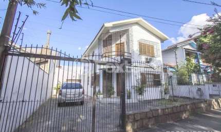 Casa com 3 quartos à venda na Rua Vera Cruz, 391, Vila Ipiranga, Porto Alegre, 147 m2 por R$ 1.190.000