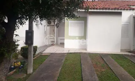Casa em condomínio fechado com 3 quartos à venda na Estrada Caminho do Meio, 5425, Stella Maris, Alvorada, 66 m2 por R$ 304.000