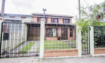 Casa com 6 quartos à venda na Rua Professor Pedro Santa Helena, 255, Jardim do Salso, Porto Alegre, 300 m2 por R$ 850.000