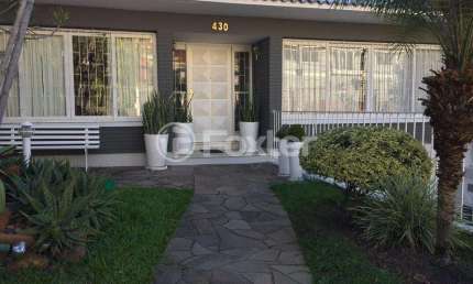 Casa com 5 quartos à venda na Avenida General Barreto Viana, 430, Chácara das Pedras, Porto Alegre, 392 m2 por R$ 1.550.000