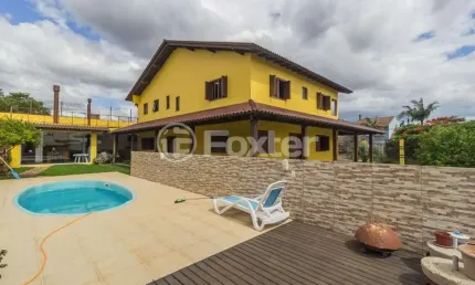 Casa com 4 quartos à venda na Rua Hermínio Leal de Albuquerque, 1025, Parque Santa Fé, Porto Alegre, 509 m2 por R$ 1.698.000