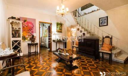 Casa com 3 quartos à venda na Rua Eudoro Berlink, 204, Auxiliadora, Porto Alegre, 145 m2 por R$ 1.250.000