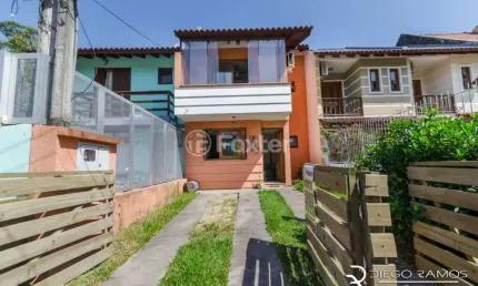 Casa com 3 quartos à venda na Rua Vacaria, 255, Hípica, Porto Alegre, 125 m2 por R$ 475.000