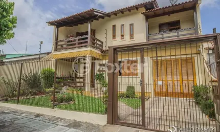 Casa com 4 quartos à venda na Avenida José Corrêa da Silva, 117, Cavalhada, Porto Alegre, 318 m2 por R$ 800.000