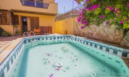 Casa com 4 quartos à venda na Rua Pinto da Rocha, 383, Partenon, Porto Alegre, 420 m2 por R$ 900.000